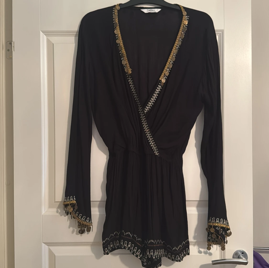 Svart jumpsuit från Doutzen's Stories