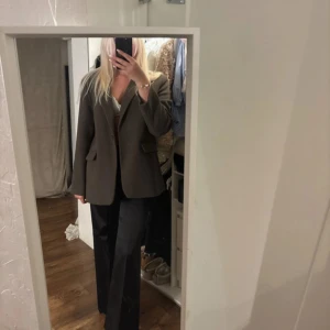 Brun kavaj  - Från hm storlek L 