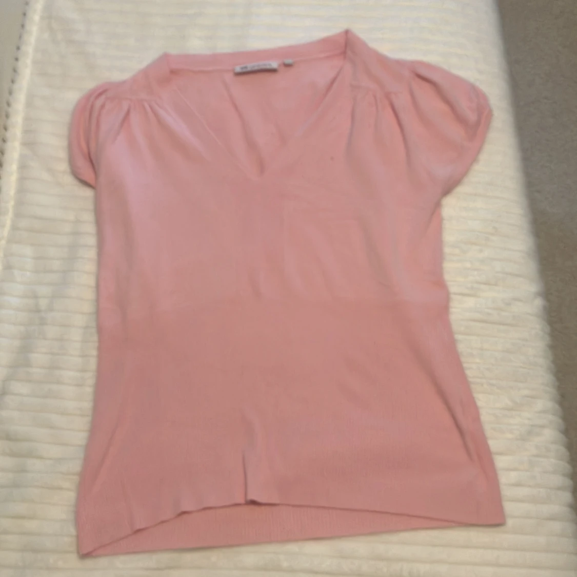 Ljusrosa v-ringad topp från Gianini - 1