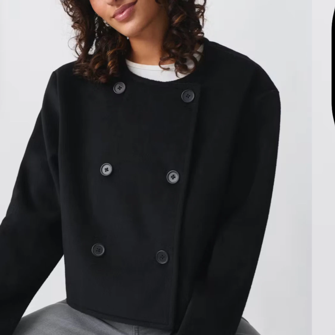 Svart kappa med knappar - 1