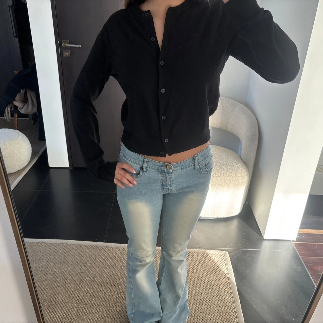 Svart kofta med knappar