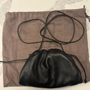 Bottega Veneta Pouch mini - Helt ny, aldrig använd. Kommer med dustbag. 