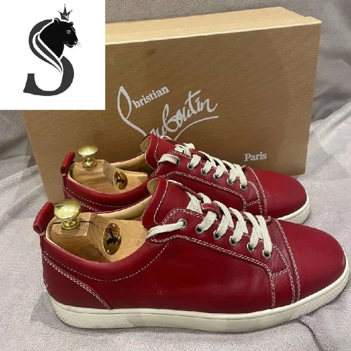 Röda sneakers från Christian Louboutin