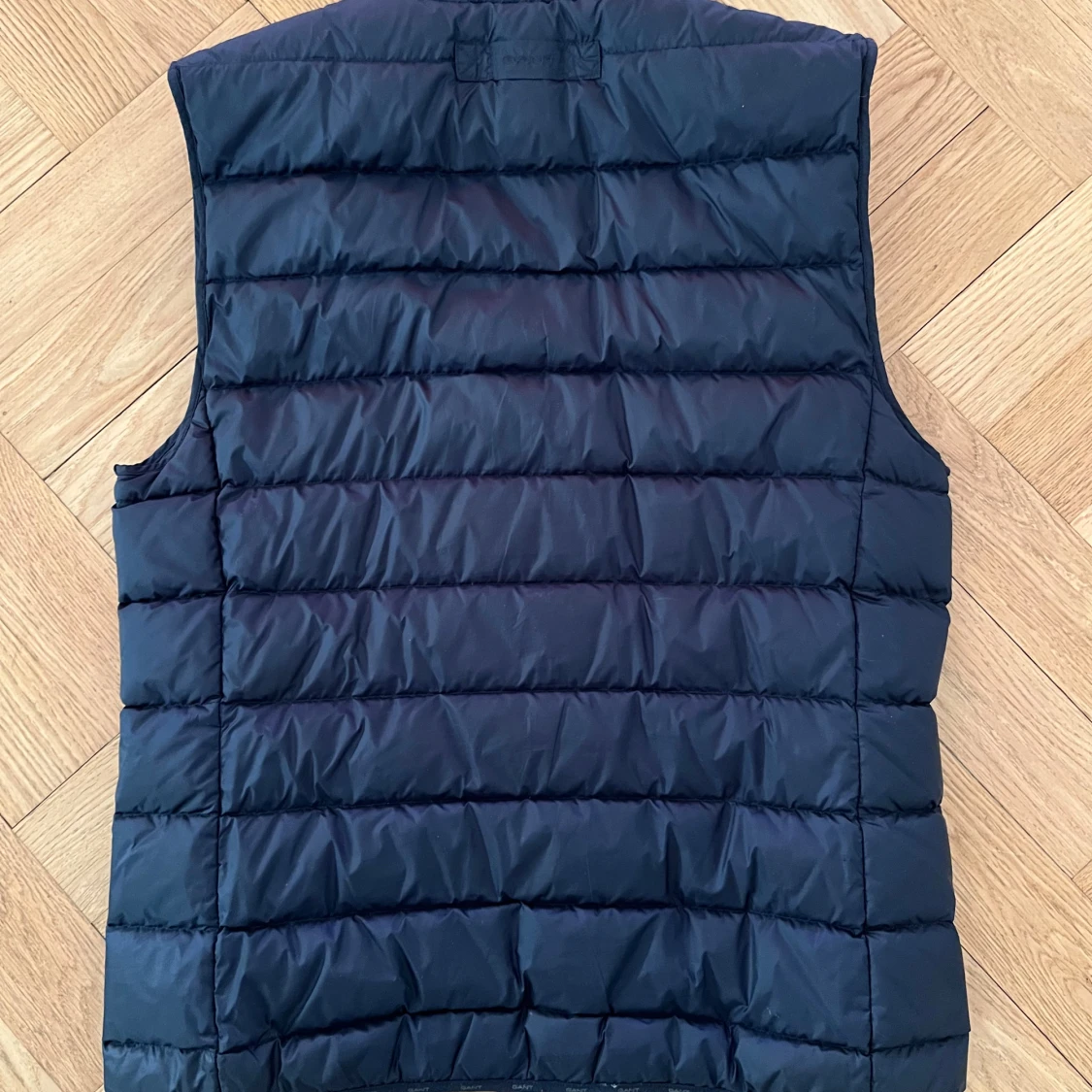 Marinblå dunväst från GANT strl M - 1