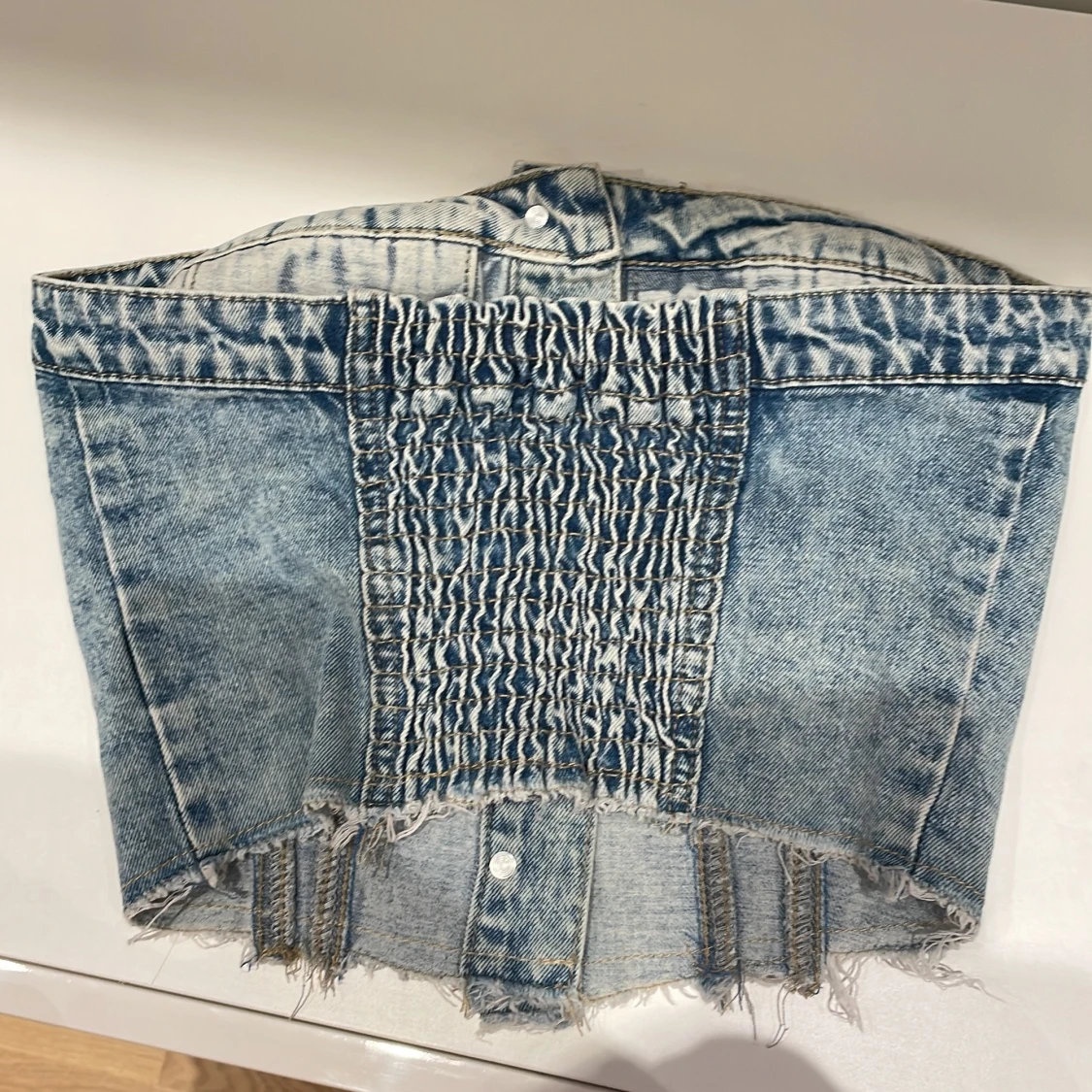 Jeans korsett med knappar, aldrig använt. Storlek XS - 1