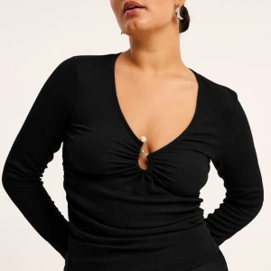 blus - ny med prislappen kvar 