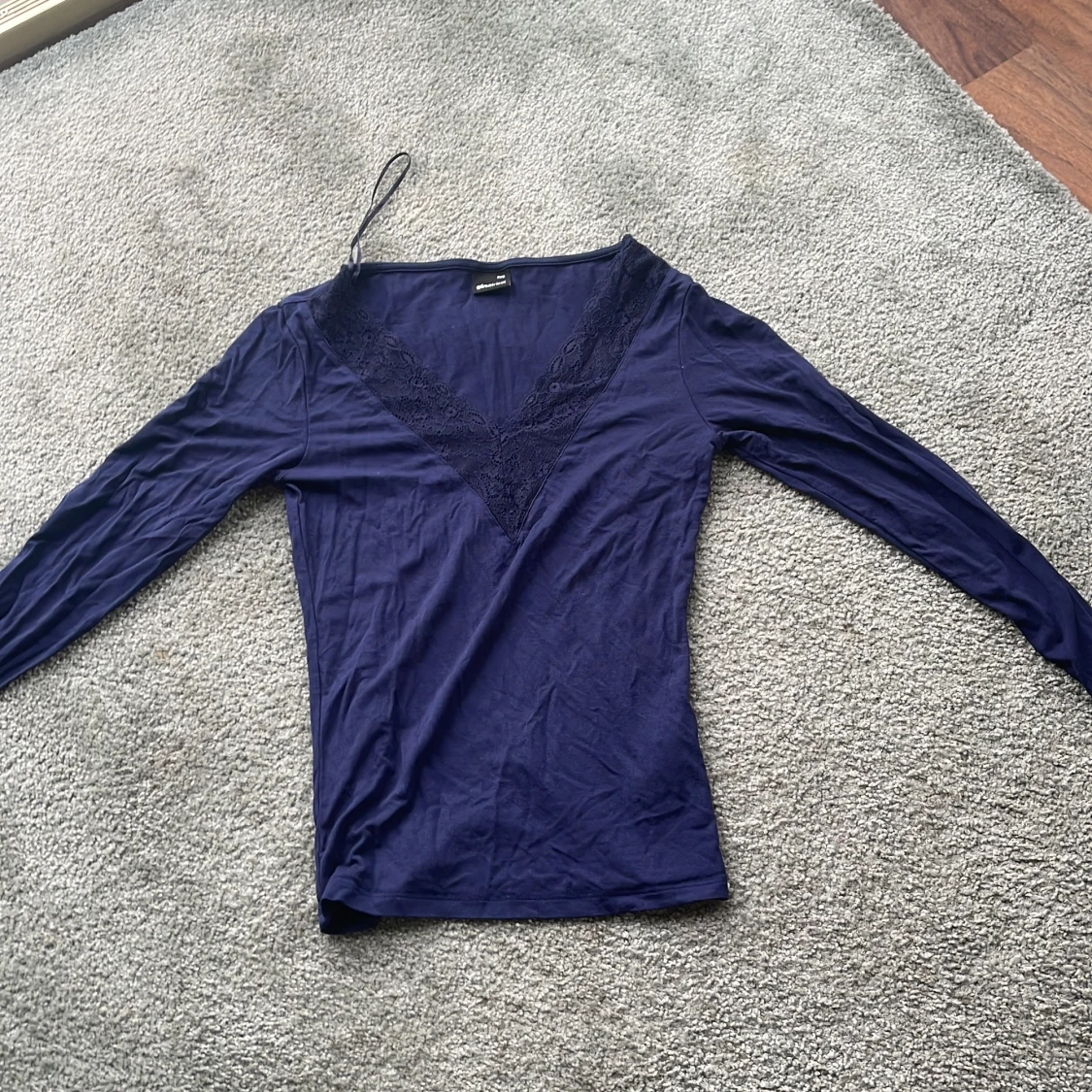 Mörkblå långärmad topp från Gina Tricot