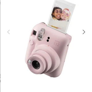 Polaroid kamera, grå - Nästan aldrig använt, kostade 1000kr, säljer för 700kr 