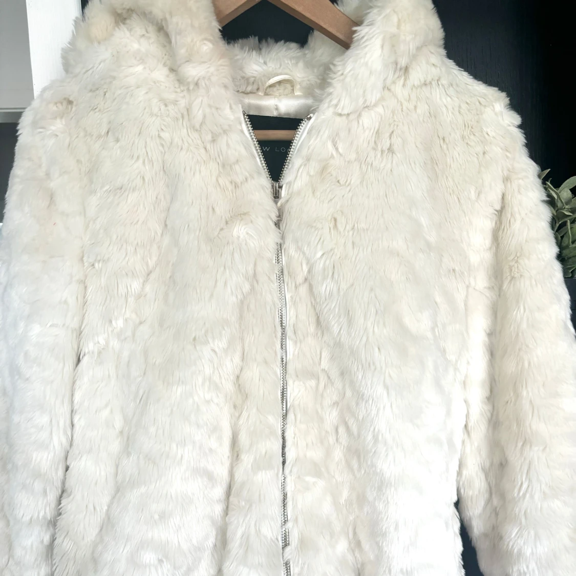 Vit pälsjacka 