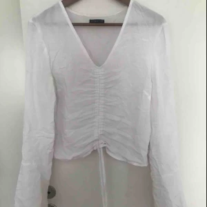  - Topp man kan dra ihop i mitten