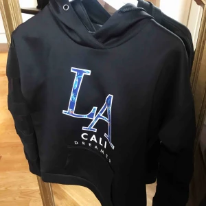  - hoodie med mesh ärmar, jättefint skick.