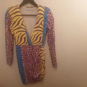 Colourful dress, Very comfortable, elegant and sexy. Long enough. 