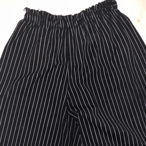  - Vida randiga byxor köpta i Italien. Frakt tillkommer