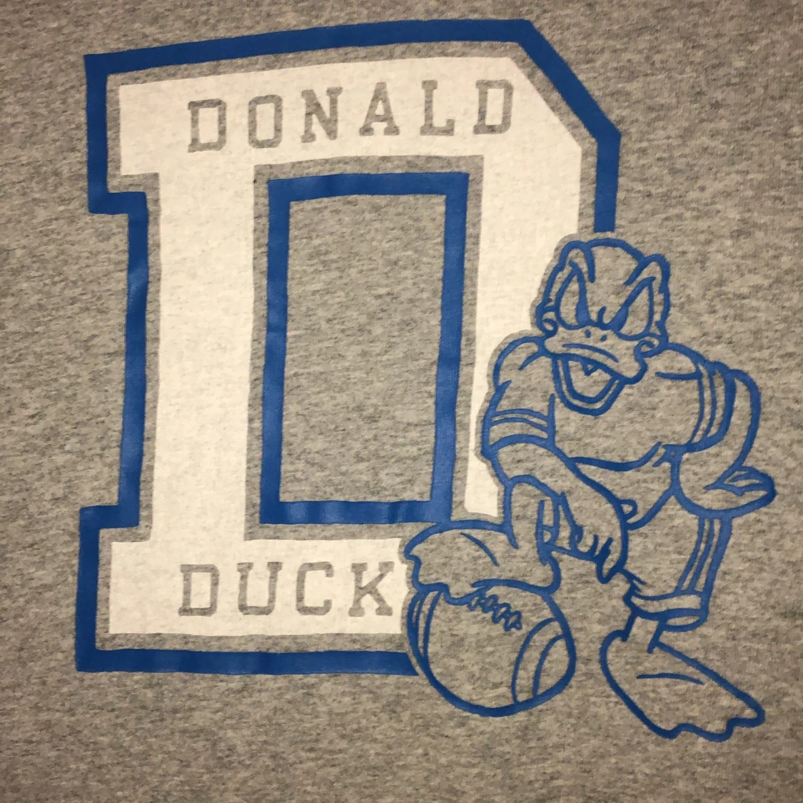 Uniqlo Donald Duck långärmad strl S - 91