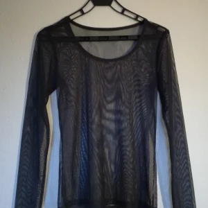 Grå meshtopp - Ej använd. Frakt tillkommer 