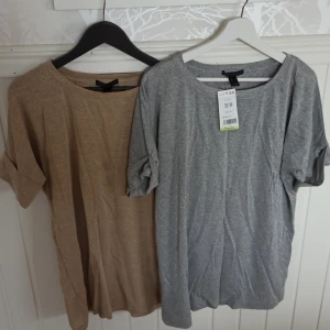 Mango t-shirtar aldrig använda - En silvrig och en guldig t-shirt, aldrig använda. Priset gäller för båda. Oversizemodell.