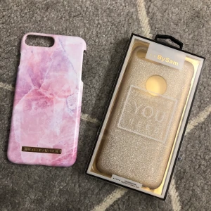 Iphone 8 plus - Två skal en från ideal of sweden 50 kr och andra från bysam 50 kr  Både skalen passar för iphone 8 plus och iphone 7 plus