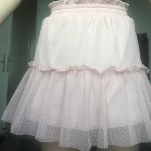 Rosa/beige kjol - FRAKT INGÅR INTE I PRISET! Något kort.