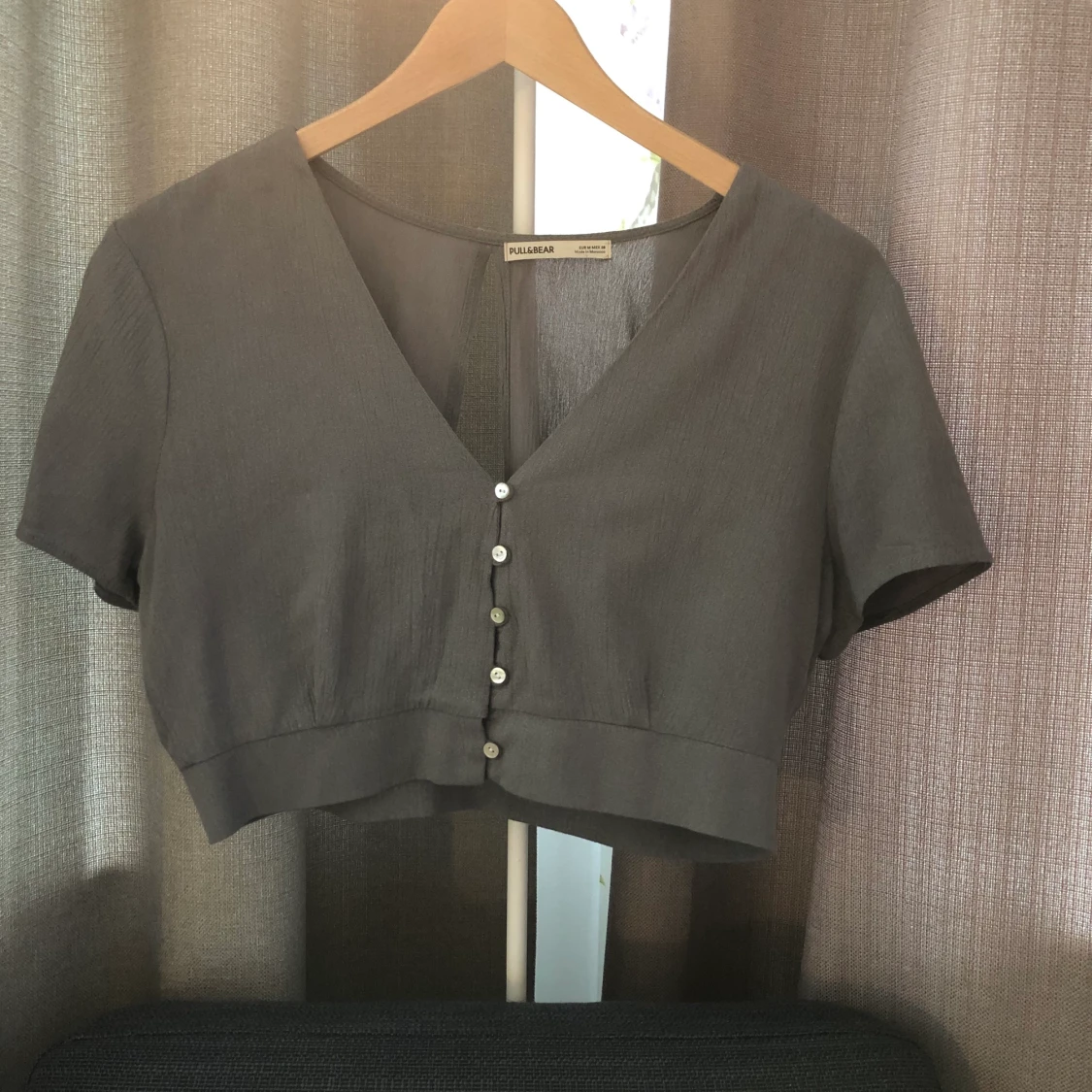 Topp med öppen rygg