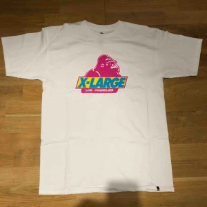  - X-large t shirt, never worn, medium but fits oversized