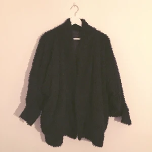  - Warm black lambskin-like jacket