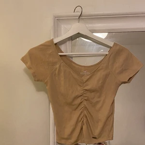 Beige/ljusrosa topp - Beige/ljusrosa topp från Hollister