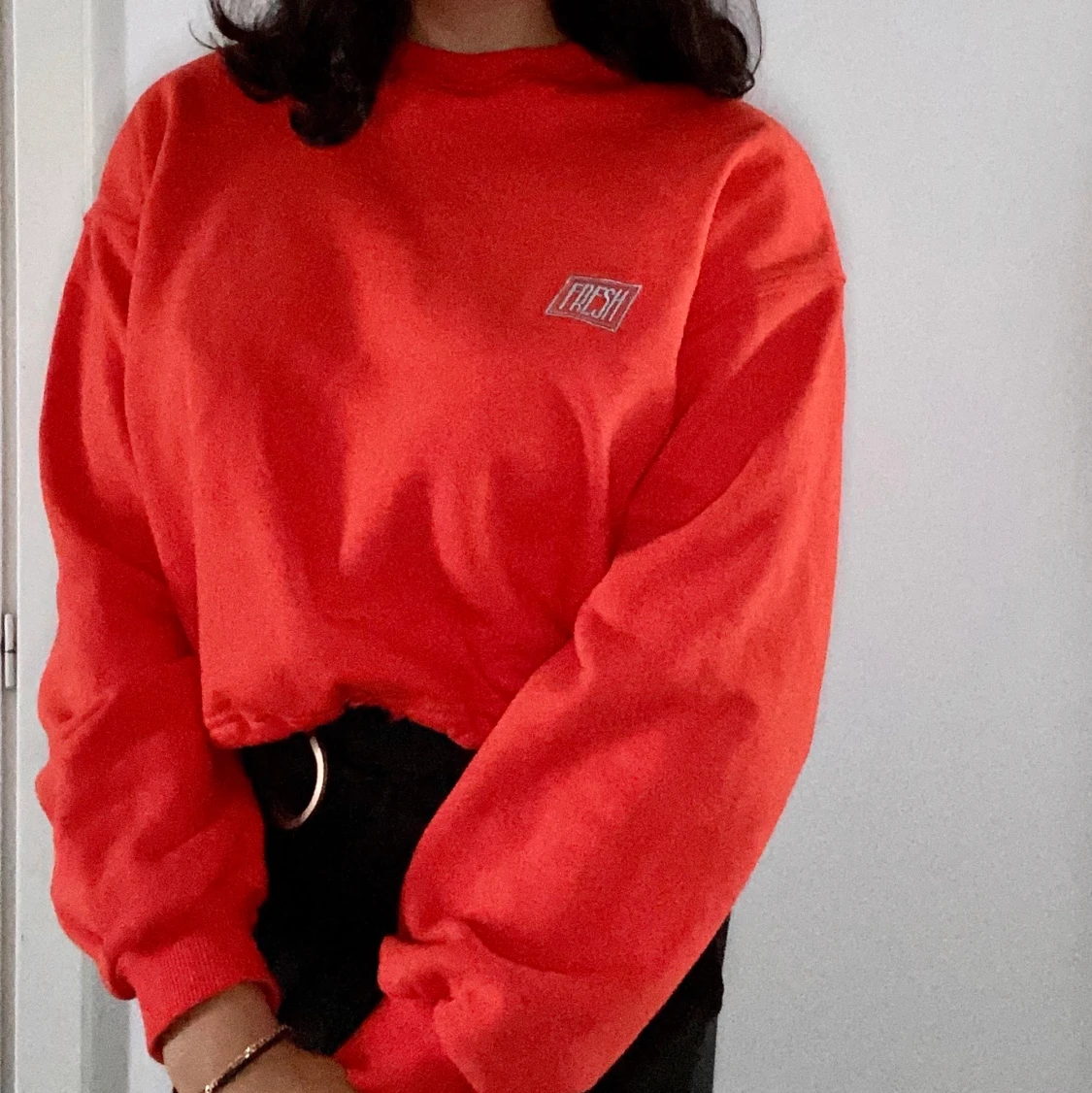 Långärmad röd/orange sweater