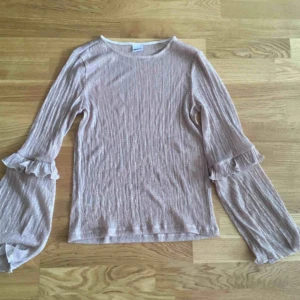  - Glittrig tröja från Gina 