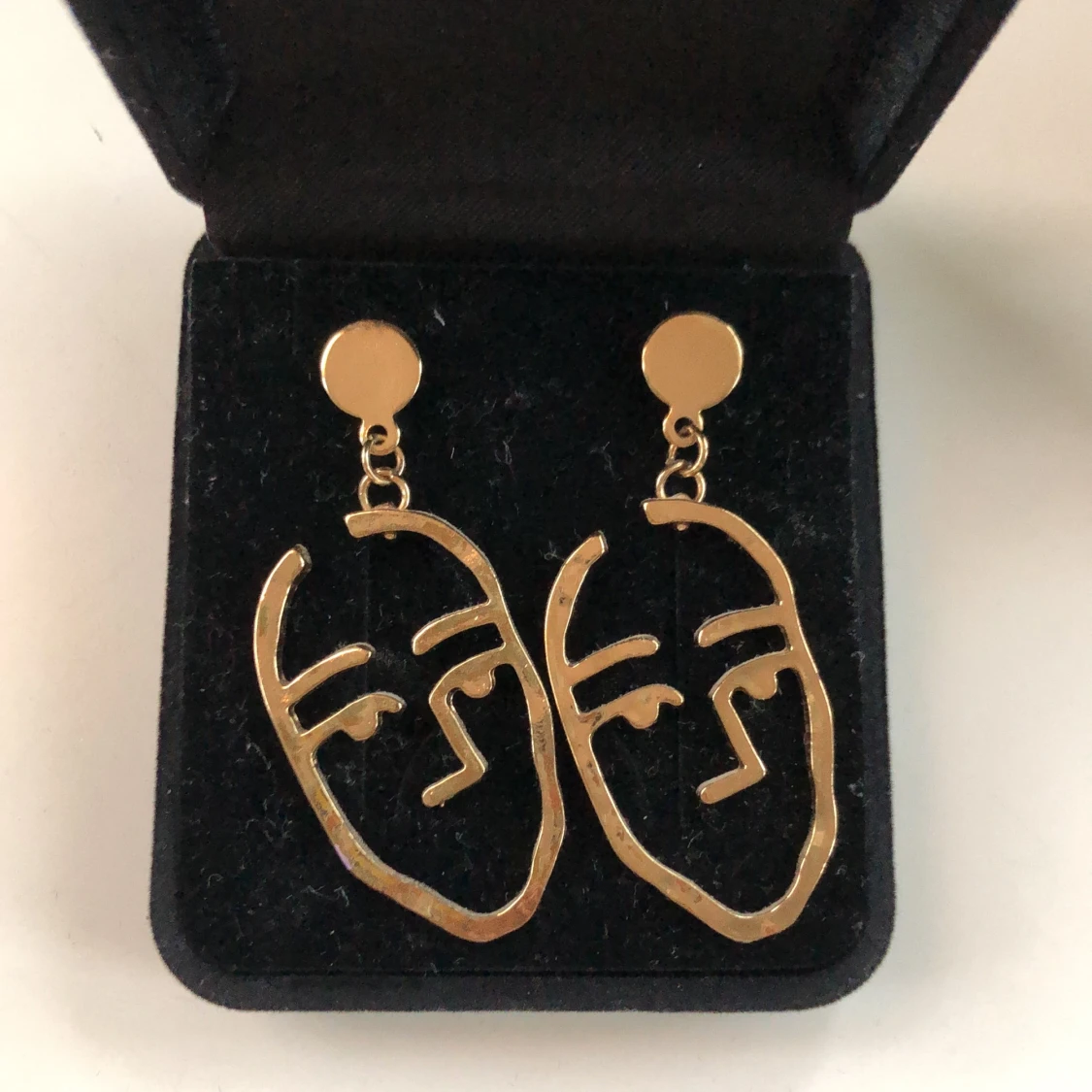 Oanvända guldörhängen  - 90