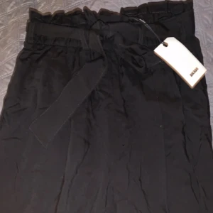 Byxor - Helt nya med taggen på