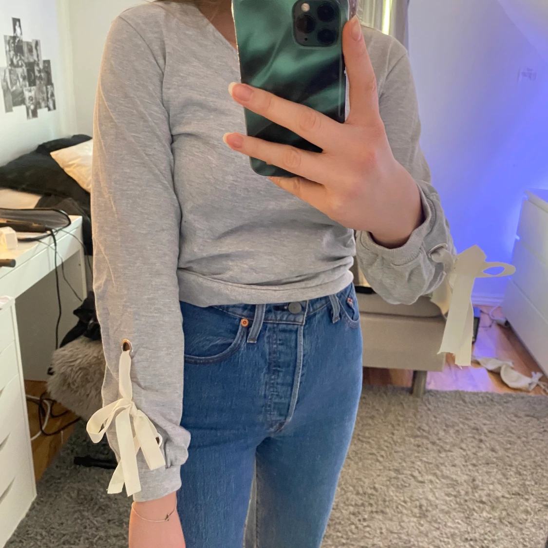 Tröja med rosett i ärmen