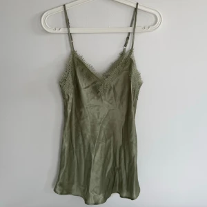 Spets linne - Ljusgrönt spets linne från primark, aldrig använd(lappen är kvar).