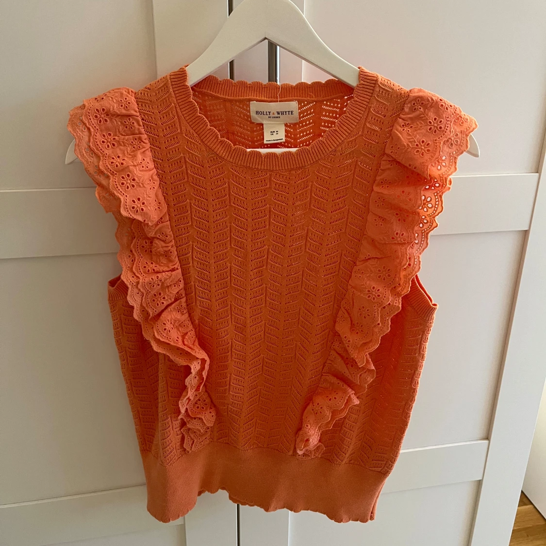 Orange ärmlös topp
