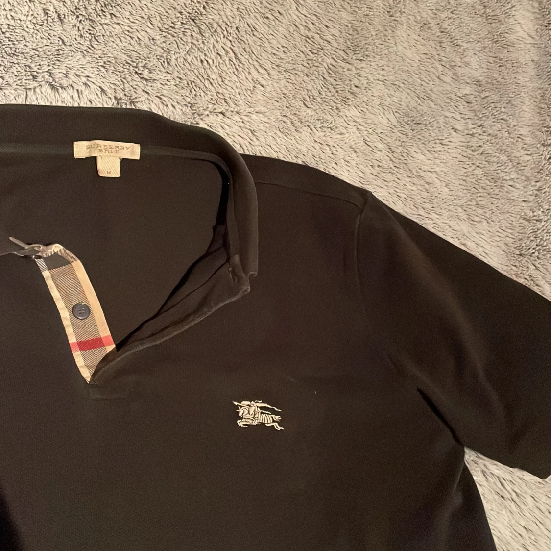 Svart kortärmad pikétröja från Burberry - 1