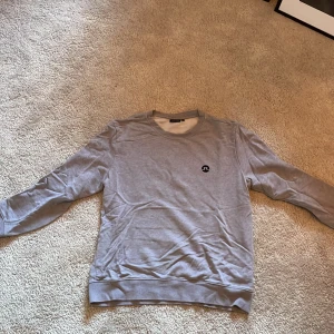 Grå J Lindeberg sweatshirt  - Skick 9/10