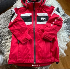 HH jacka - Vind och vattenavvisande jacka.  Helly Hansen Djur och rökfritt hem 