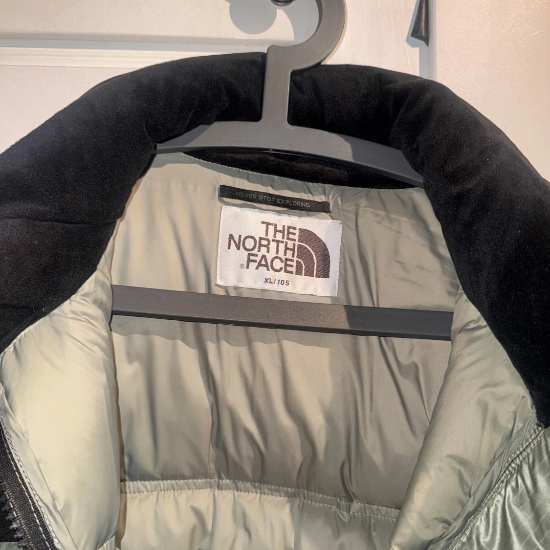 Grön och svart dunjacka från The North Face - 92