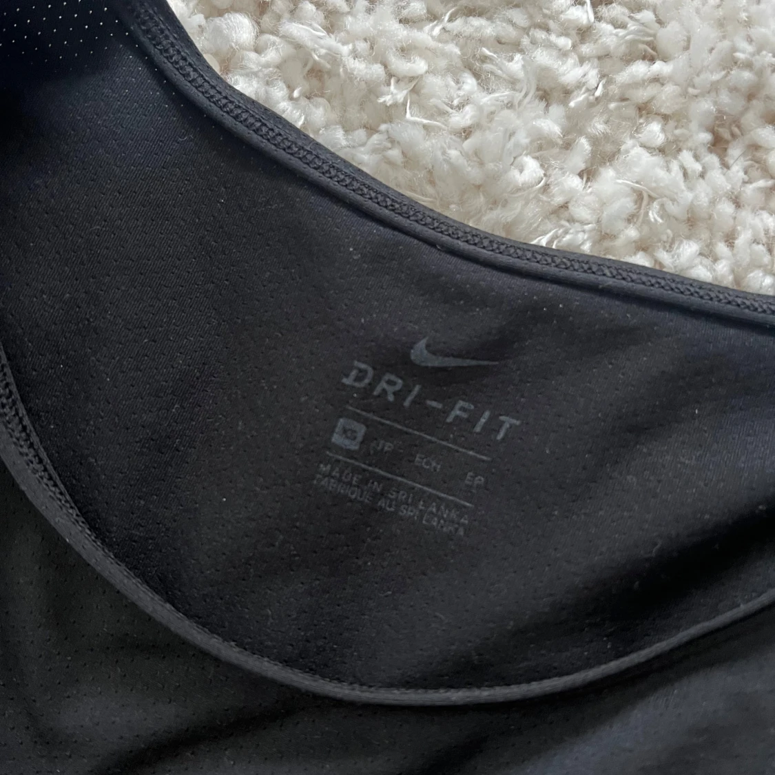 Svart Dri-Fit topp från Nike - 90