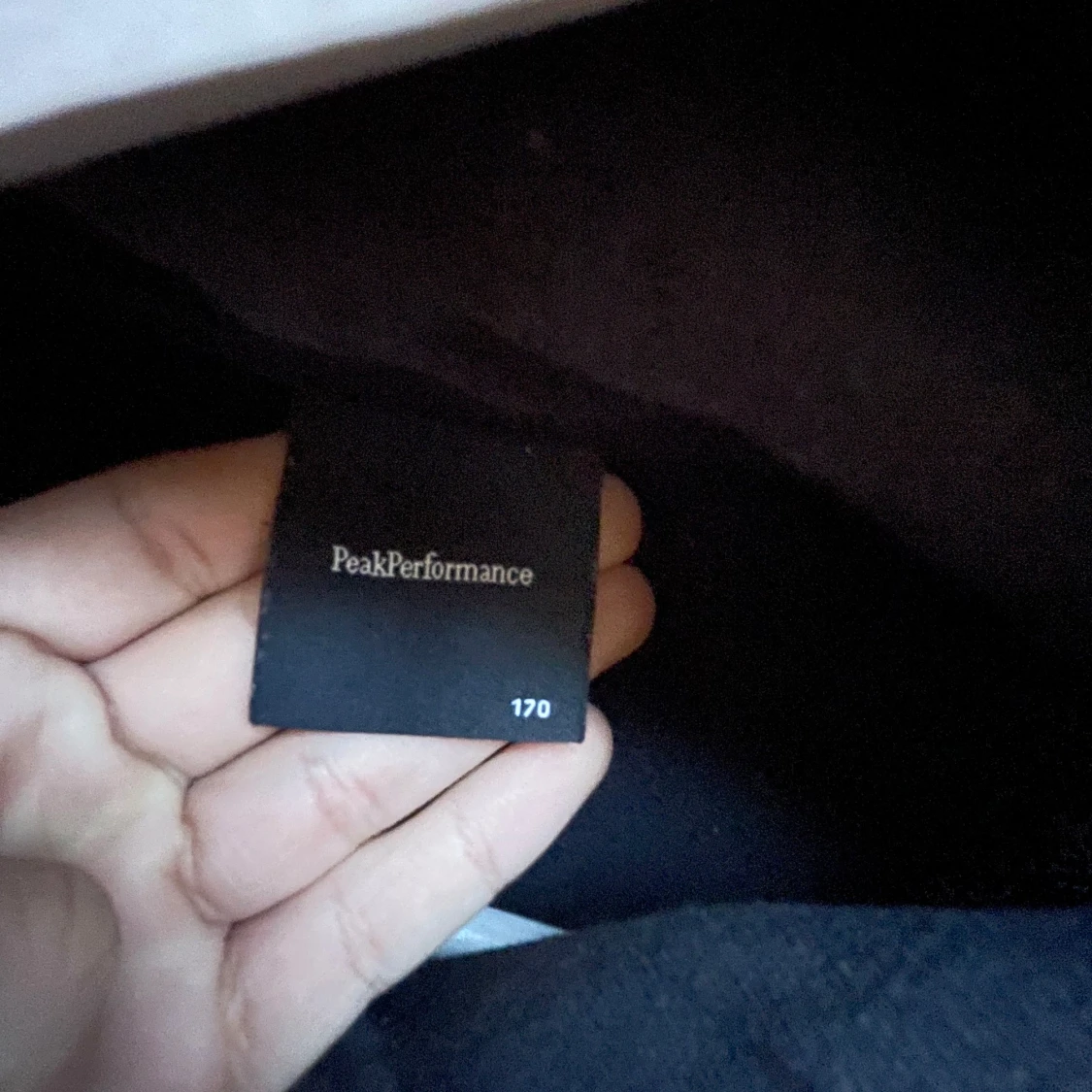 Svart hoodie från Peak Performance - 90