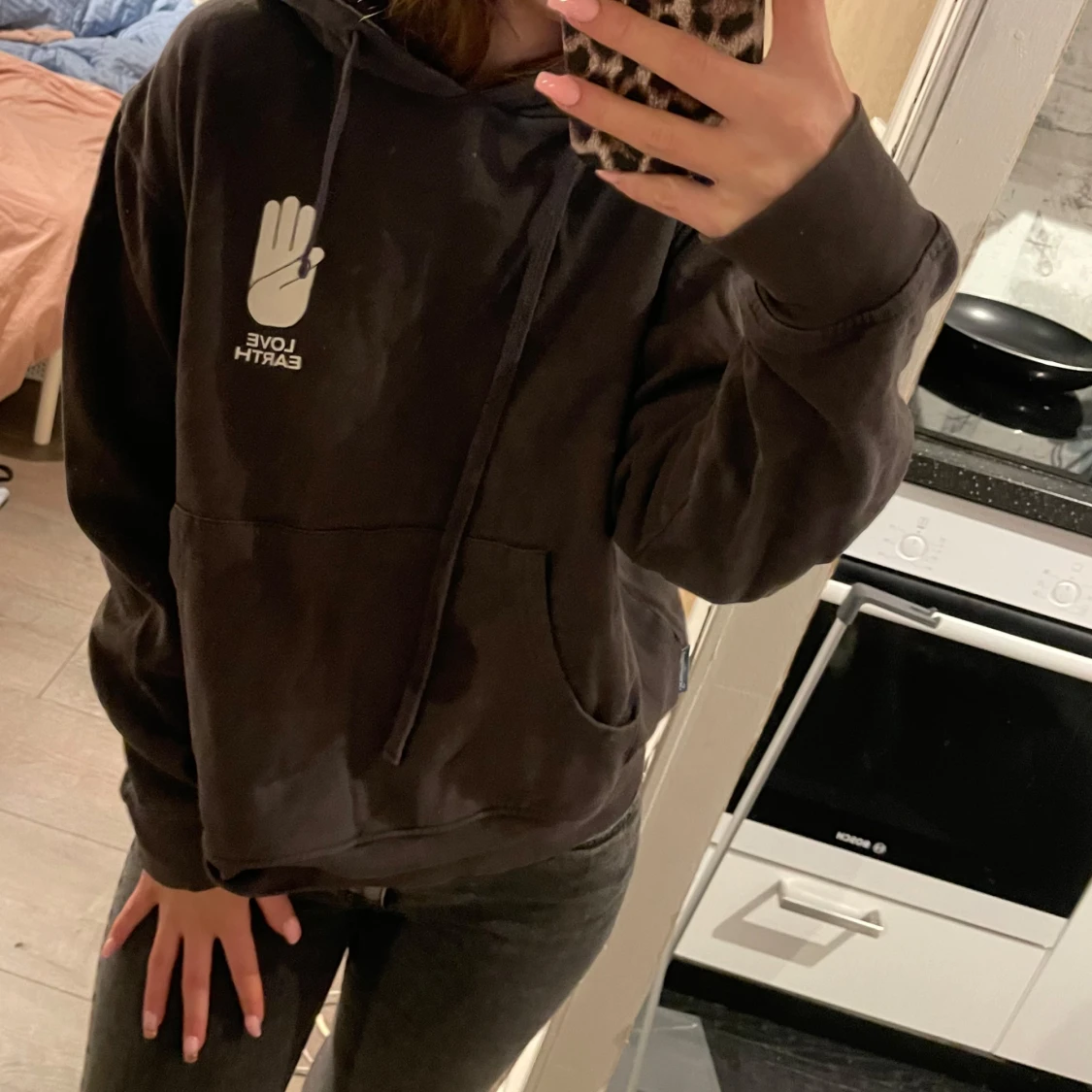 Svart hoodie från Scouterna