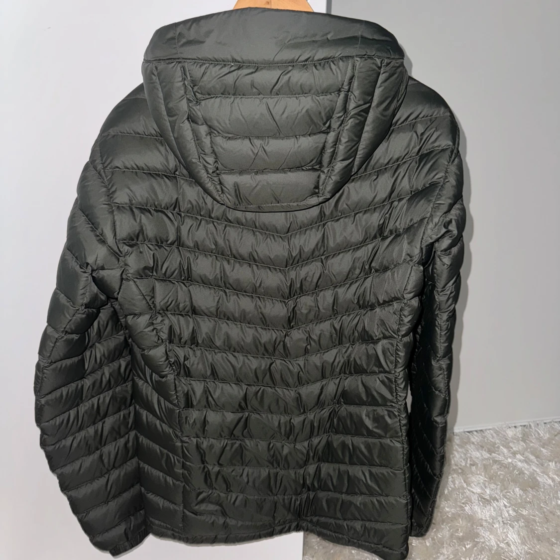 Grön dunjacka Peak Performance - 90