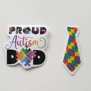 2st proud autism dad, klistermärken/stickers  - Klistermärken/stickers Motiv: autism,  Antal: 2st  Skick: ny/oanvänd Kul att använda till pyssel, scrapbooking och annat. Kan tex användas till att dekorera din bärbara dator, anteckningsbok, resväska, 