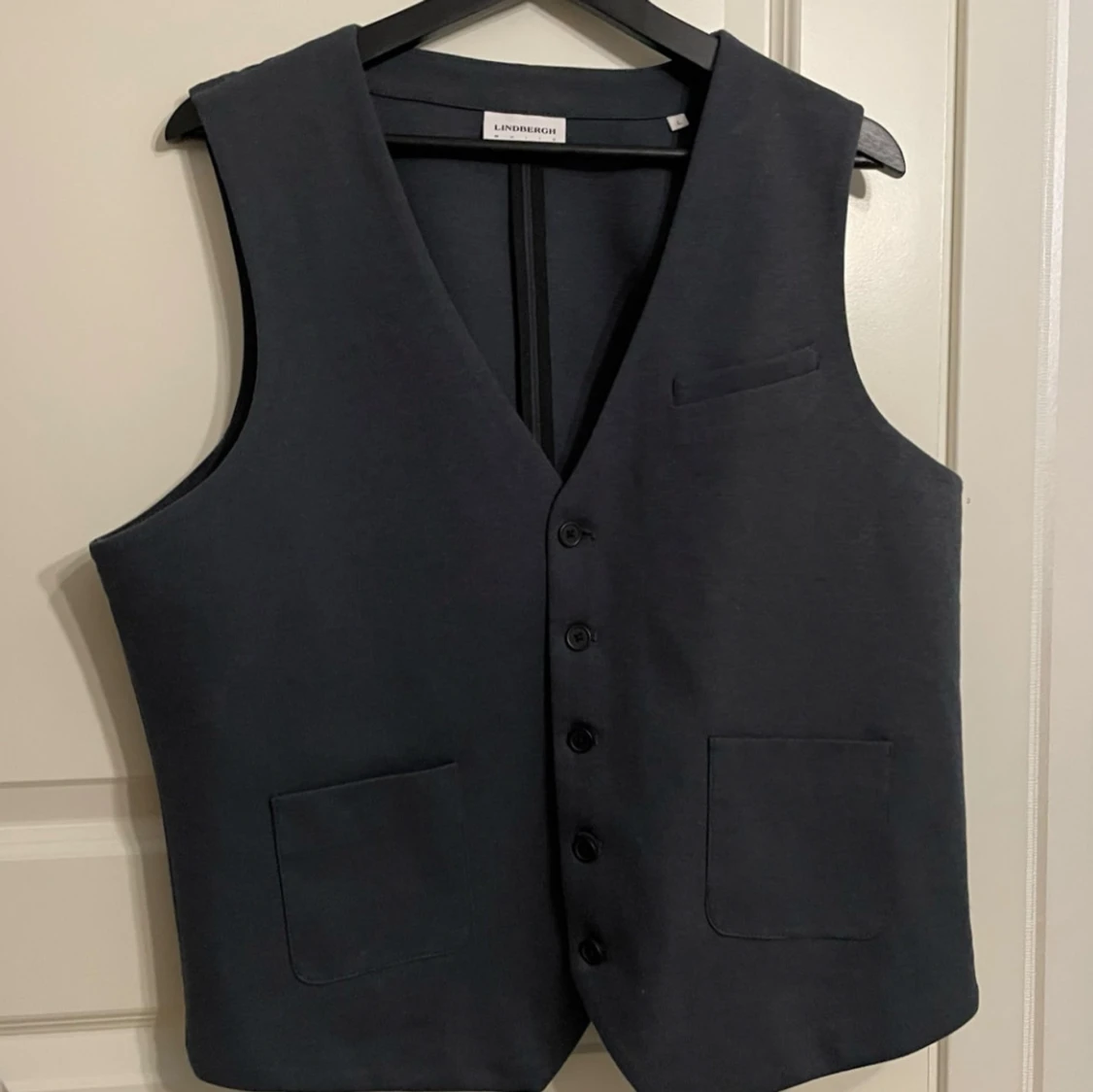 Väst mörkgrå stl L från Lindberg