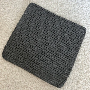 Virkad disktrasa  - En grå egen virkad disktrasa 