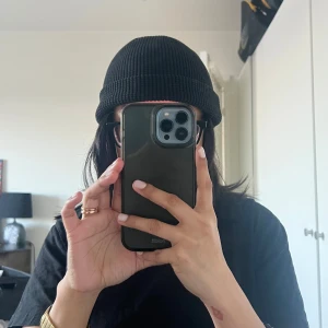 Vintern mössa - Använd en gång. Mössan är från East West och den är herrmössa men passar unisex. 