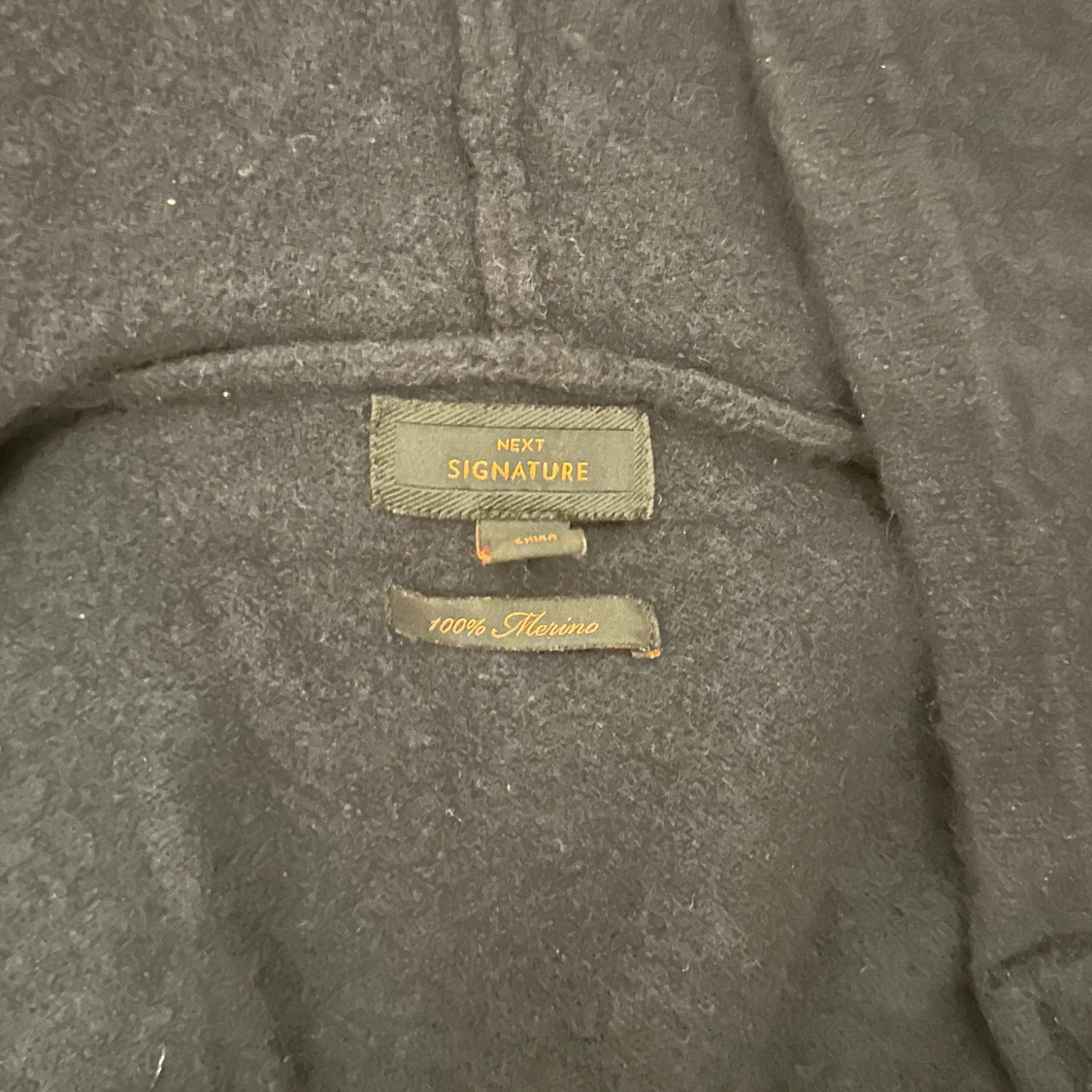 Svart merinojacka från Next Signature - 2