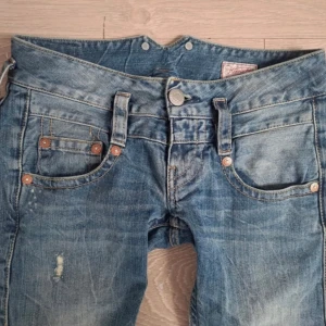 Lågmidjade jeans - Blå lågmidjade jeans