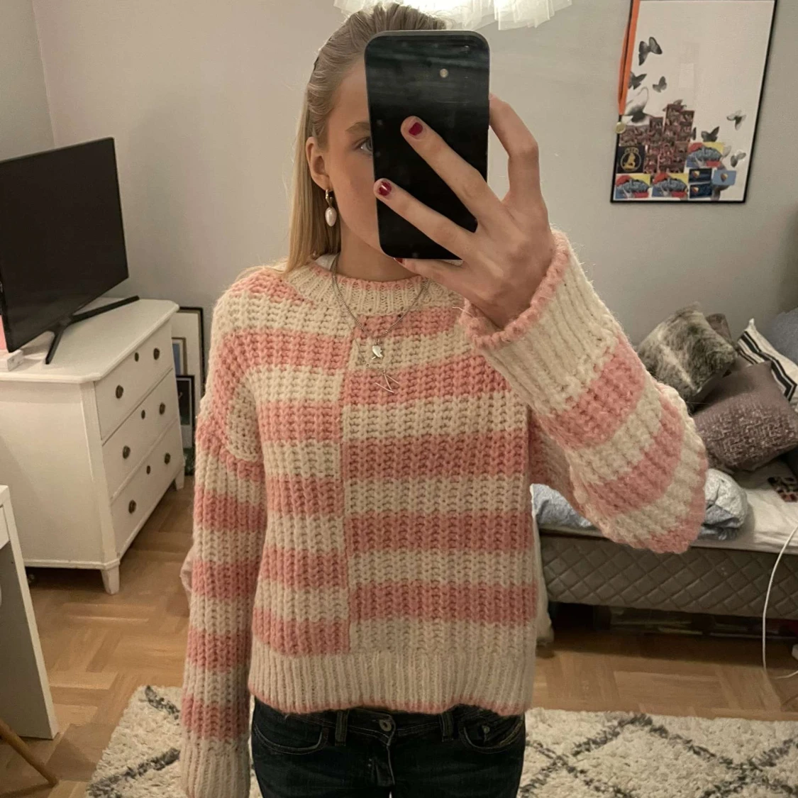 Rosa och vit randig stickad tröja