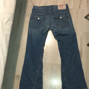 Blue joey true religion boot cut jeans - Selling blue jeans from True Religion model Joey size 31x34. They have  bootcut style and are in good condition.