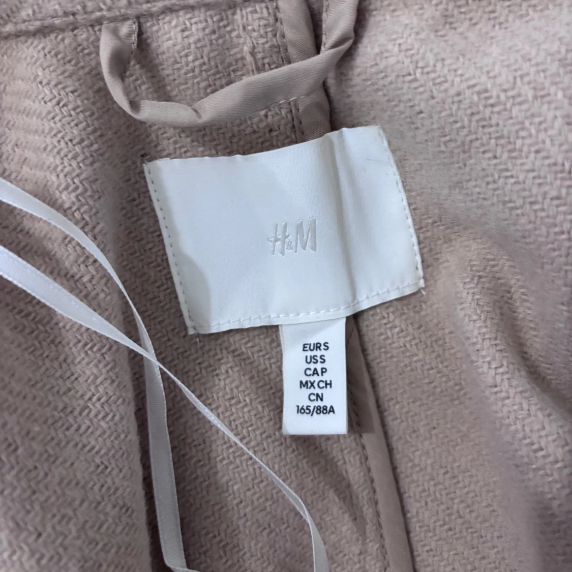 Beige kappa från H&M - 2